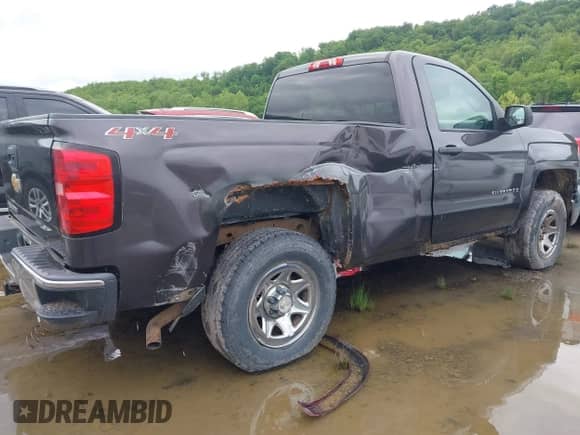 2014 Chevrolet Silverado 1500 Work Truck z VIN 1GCNKPEC6EZ296723, wystawiony jako IAAI lot #42336207 z przebiegiem 247 718 mil mil oraz . Historia ofert i sprzedaży dostępna na DreamBid. Obrazek 4.