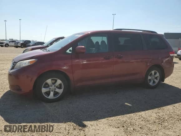 2012 Toyota Sienna with VIN 5TDZK3DCXCS189720, listed as a Copart auction lot 66879435 with 263,075 mi miles and Salvage title. Bid and sale history available at DreamBid. Image 1.