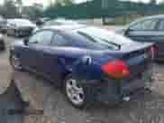 2003 Hyundai Tiburon with VIN KMHHM65D23U083655, listed as a IAAI auction lot 42923698 with Not provided miles and . Bid and sale history available at DreamBid. Image 3.