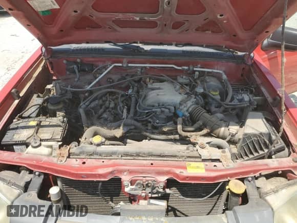 2003 Nissan Frontier XE with VIN 1N6ED29X03C457784, listed as a Copart auction lot 60286075 with 258,840 mi miles and Clean title. Bid and sale history available at DreamBid. Image 11.