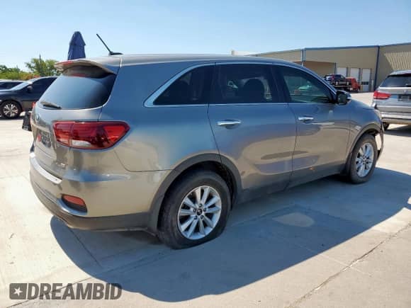 2019 Kia Sorento L z VIN 5XYPG4A36KG496705, wystawiony jako Copart lot #71458785 z przebiegiem 202 283 mil mil oraz Czysty tytuł • Clean title. Historia ofert i sprzedaży dostępna na DreamBid. Obrazek 3.