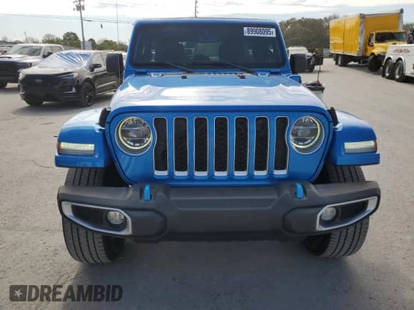 2022 Jeep Wrangler Unlimited Sahara with VIN 1C4JJXP66NW275039, listed as a Copart auction lot 89908095 with 57,166 mi miles and Clean title. Bid and sale history available at DreamBid. Image 5.