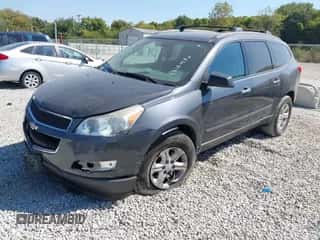 2012 Chevrolet Traverse LS z VIN 1GNKRFED5CJ347519, wystawiony jako IAAI lot #43184498 z przebiegiem 127 728 mil mil oraz . Historia ofert i sprzedaży dostępna na DreamBid. Obrazek 2.