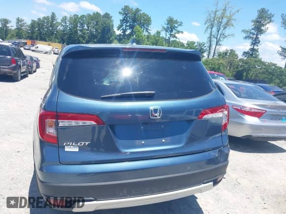 2020 Honda Pilot EX-L with VIN 5FNYF5H57LB026759, listed as a IAAI auction lot 42649916 with Not provided miles and . Bid and sale history available at DreamBid. Image 16.