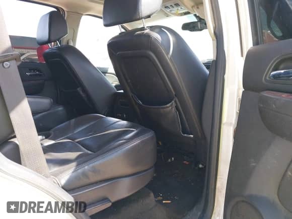 2008 Chevrolet Tahoe LTZ with VIN 1GNFC13J98R233238, listed as a IAAI auction lot 43315701 with Not provided miles and . Bid and sale history available at DreamBid. Image 8.