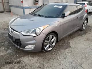 2016 Hyundai Veloster с VIN KMHTC6AD7GU253999, выставлен на аукционе Copart как лот 87533685 с пробегом 108 516 миль миль и Списание • Salvage title. История ставок и продаж доступна на DreamBid. Изображение 1.