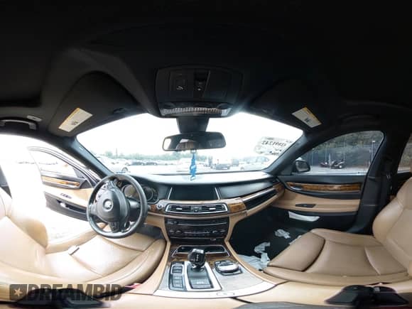 2014 BMW 7 Series ALPINA B7 xDrive with VIN WBAYF8C52ED141754, listed as a IAAI auction lot 42891242 with 108,308 mi miles and . Bid and sale history available at DreamBid. Image 19.