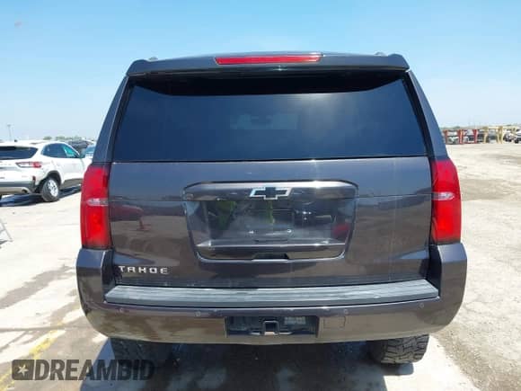 2016 Chevrolet Tahoe LS z VIN 1GNSKAKC4GR163733, wystawiony jako IAAI lot #42242113 z przebiegiem 72 619 mil mil oraz . Historia ofert i sprzedaży dostępna na DreamBid. Obrazek 17.