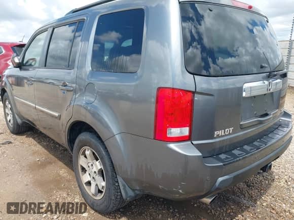 2010 Honda Pilot Touring with VIN 5FNYF3H9XAB008986, listed as a IAAI auction lot 42488828 with 126,662 mi miles and . Bid and sale history available at DreamBid. Image 3.