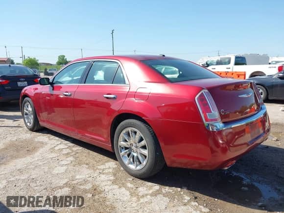 2014 Chrysler 300 C with VIN 2C3CCAEG5EH372859, listed as a IAAI auction lot 42004993 with 204,587 mi miles and . Bid and sale history available at DreamBid. Image 14.