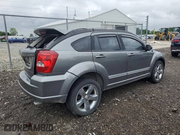 2011 Dodge Caliber Rush z VIN 1B3CB8HB8BD220852, wystawiony jako Copart lot #57391015 z przebiegiem 140 311 mil mil oraz Nie do naprawy • Non repairable. Historia ofert i sprzedaży dostępna na DreamBid. Obrazek 3.