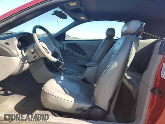 2004 Ford Mustang Deluxe с VIN 1FAFP44404F102515, выставлен на аукционе Copart как лот 75318024 с пробегом 65 383 миль миль и Списание • Salvage title. История ставок и продаж доступна на DreamBid. Изображение 7.