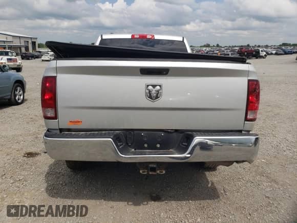 2014 Ram 1500 Tradesman z VIN 1C6RR6KG7ES233922, wystawiony jako Copart lot #59740905 z przebiegiem 114 777 mil mil oraz Szkoda całkowita • Salvage title. Historia ofert i sprzedaży dostępna na DreamBid. Obrazek 6.