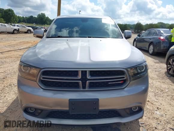 2014 Dodge Durango R/T with VIN 1C4SDHCT0EC590904, listed as a IAAI auction lot 42758420 with 163,982 mi miles and . Bid and sale history available at DreamBid. Image 12.