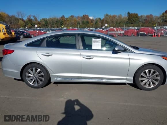 2015 Hyundai Sonata Sport with VIN 5NPE34AF3FH023033, listed as a IAAI auction lot 43522697 with 57,603 mi miles and . Bid and sale history available at DreamBid. Image 13.