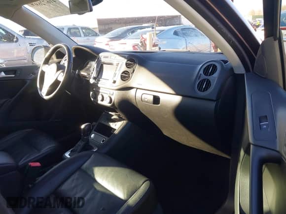 2016 Volkswagen Tiguan S with VIN WVGAV7AX6GW546573, listed as a IAAI auction lot 41672697 with 117,174 mi miles and . Bid and sale history available at DreamBid. Image 5.