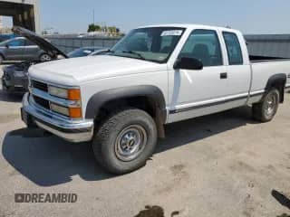 1999 Chevrolet Silverado 2500 with VIN 1GCGK29R2XF094752, listed as a Copart auction lot 66548124 with 164,155 mi miles and Salvage title. Bid and sale history available at DreamBid. Image 1.