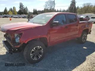 2021 Chevrolet Colorado 4WD Z71 with VIN 1GCGTDEN0M1259671, listed as a Copart auction lot 53388675 with 61,556 mi miles and Salvage title. Bid and sale history available at DreamBid. Image 1.