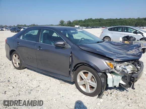 2014 Toyota Camry LE with VIN 4T1BF1FK8EU823244, listed as a Copart auction lot 70004005 with Not provided miles and Salvage title. Bid and sale history available at DreamBid. Image 4.