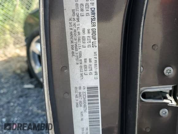 2013 Dodge Charger SXT Plus z VIN 2C3CDXHG0DH667541, wystawiony jako Copart lot #65617635 z przebiegiem 173 596 mil mil oraz Szkoda całkowita • Salvage title. Historia ofert i sprzedaży dostępna na DreamBid. Obrazek 12.