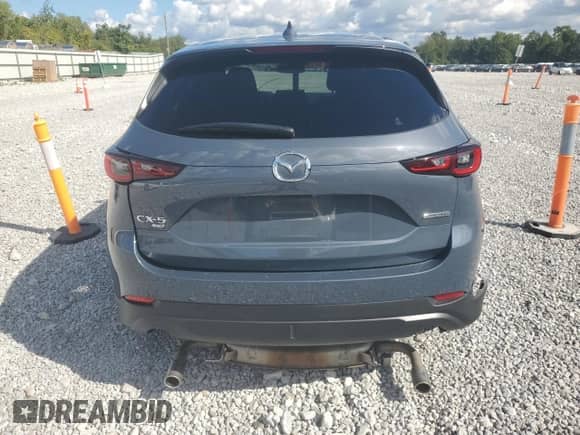 2023 Mazda CX-5 S Carbon Edition z VIN JM3KFBCM7P0169757, wystawiony jako Copart lot #70624645 z przebiegiem 31 275 mil mil oraz Szkoda całkowita • Salvage title. Historia ofert i sprzedaży dostępna na DreamBid. Obrazek 6.