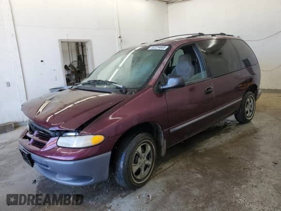 1999 Dodge Caravan with VIN 2B4FP2530XR198421, listed as a Copart auction lot 52224685 with Not provided miles and Salvage title. Bid and sale history available at DreamBid. Image 1.