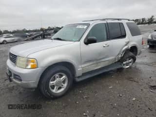 2002 Ford Explorer XLT with VIN 1FMZU73E42UC13262, listed as a Copart auction lot 86119365 with 217,906 mi miles and Salvage title. Bid and sale history available at DreamBid. Image 1.