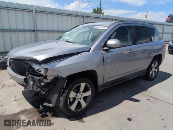 2016 Jeep Compass Latitude with VIN 1C4NJDEB4GD638985, listed as a Copart auction lot 62556945 with 83,142 mi miles and Salvage title. Bid and sale history available at DreamBid. Image 1.