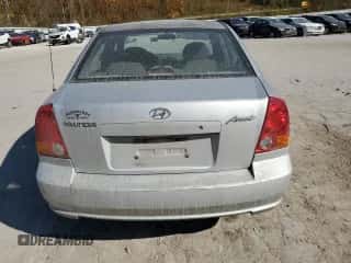 2005 Hyundai Accent GLS с VIN KMHCG45C75U638812, выставлен на аукционе Copart как лот 77968234 с пробегом 130 815 миль миль и Списание • Salvage title. История ставок и продаж доступна на DreamBid. Изображение 6.