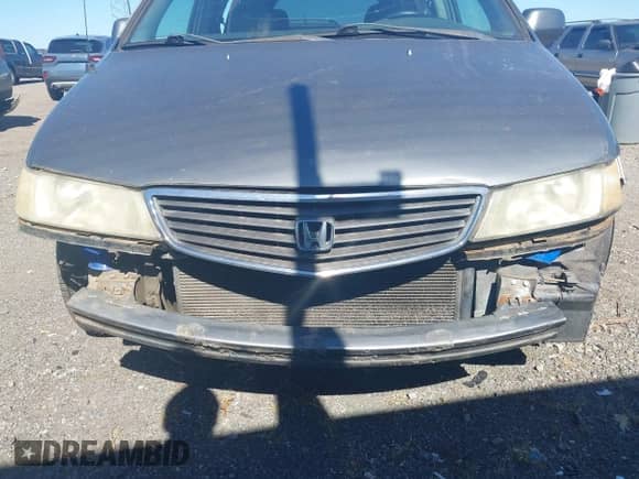 2001 Honda Odyssey EX z VIN 2HKRL18601H610966, wystawiony jako IAAI lot #43380576 z przebiegiem 184 426 mil mil oraz . Historia ofert i sprzedaży dostępna na DreamBid. Obrazek 6.