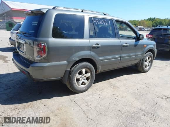 2007 Honda Pilot EX with VIN 2HKYF184X7H500209, listed as a IAAI auction lot 43201517 with 77,309 mi miles and . Bid and sale history available at DreamBid. Image 4.