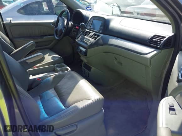 2007 Honda Odyssey EX-L z VIN 5FNRL38787B080046, wystawiony jako IAAI lot #42240227 z przebiegiem 138 073 mil mil oraz . Historia ofert i sprzedaży dostępna na DreamBid. Obrazek 5.