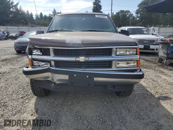1997 Chevrolet Suburban with VIN 3GNFK16R6VG194124, listed as a Copart auction lot 66565685 with 276,034 mi miles and Salvage title. Bid and sale history available at DreamBid. Image 5.