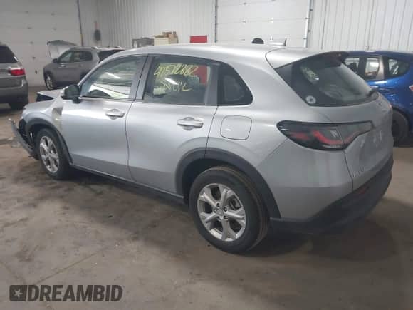 2024 Honda HR-V LX z VIN 3CZRZ2H31RM756478, wystawiony jako IAAI lot #42372882 z przebiegiem 10 166 mil mil oraz . Historia ofert i sprzedaży dostępna na DreamBid. Obrazek 3.
