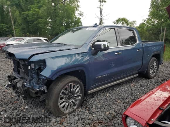 2024 GMC Sierra 1500 Denali Ultimate with VIN 1GTUUHE86RZ300931, listed as a Copart auction lot 64272755 with 20,483 mi miles and Salvage title. Bid and sale history available at DreamBid. Image 1.