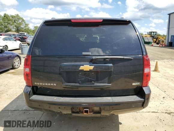 2012 Chevrolet Suburban LT with VIN 1GNSKJE7XCR226326, listed as a Copart auction lot 71700735 with 241,790 mi miles and Salvage title. Bid and sale history available at DreamBid. Image 6.