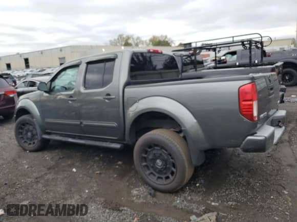 2005 Nissan Frontier SE z VIN 1N6AD07W65C429259, wystawiony jako Copart lot #82269745 z przebiegiem 368 958 mil mil oraz Szkoda całkowita • Salvage title. Historia ofert i sprzedaży dostępna na DreamBid. Obrazek 2.