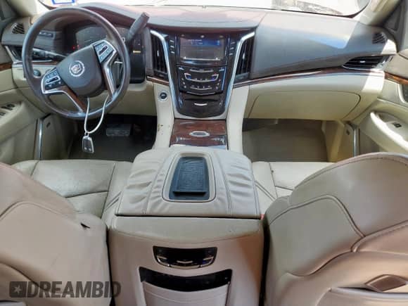 2015 Cadillac Escalade ESV Premium с VIN 1GYS4JKJ8FR200079, выставлен на аукционе Copart как лот 69646725 с пробегом 180 522 миль миль и Списание • Salvage title. История ставок и продаж доступна на DreamBid. Изображение 8.