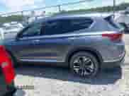 2019 Hyundai Santa Fe Limited with VIN 5NMS53AA8KH019448, listed as a IAAI auction lot 42523814 with 105,414 mi miles and . Bid and sale history available at DreamBid. Image 14.