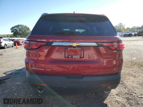2023 Chevrolet Traverse LT Cloth with VIN 1GNEVGKW5PJ332237, listed as a Copart auction lot 82366415 with 21,614 mi miles and Salvage title. Bid and sale history available at DreamBid. Image 6.