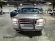 2000 GMC Sierra 1500 SLE z VIN 1GTEK14T7YE299382, wystawiony jako Copart lot #81603295 z przebiegiem 128 560 mil mil oraz Szkoda całkowita • Salvage title. Historia ofert i sprzedaży dostępna na DreamBid. Obrazek 13.