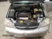2005 Chevrolet Optra LS с VIN KL1JK59Z05K207455, выставлен на аукционе Copart как лот 79134294 с пробегом 209 198 миль миль и Чистый • Clean title. История ставок и продаж доступна на DreamBid. Изображение 11.