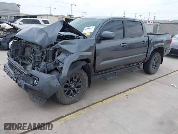 2023 Toyota Tacoma SR5 z VIN 3TMAZ5CN0PM200298, wystawiony jako IAAI lot #42880608 z przebiegiem 73 069 mil mil oraz . Historia ofert i sprzedaży dostępna na DreamBid. Obrazek 18.