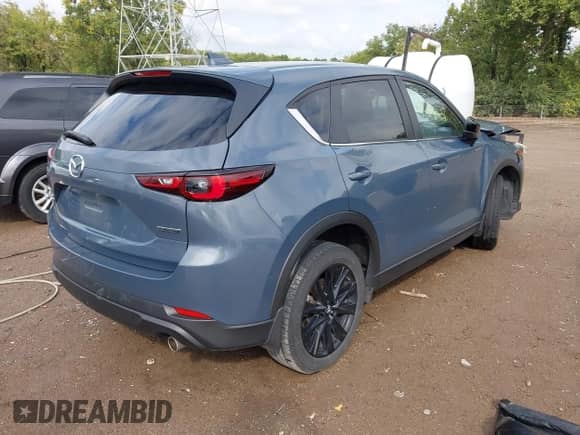 2023 Mazda CX-5 S Carbon Edition с VIN JM3KFBCM9P0167900, выставлен на аукционе IAAI как лот 43291236 с пробегом 40 306 миль миль и . История ставок и продаж доступна на DreamBid. Изображение 4.