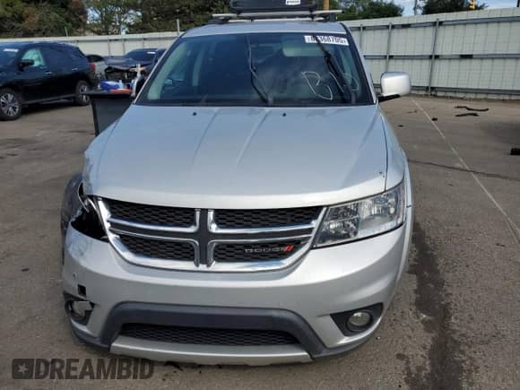 2014 Dodge Journey SXT with VIN 3C4PDDBG4ET190769, listed as a Copart auction lot 80368705 with 140,649 mi miles and Salvage title. Bid and sale history available at DreamBid. Image 5.