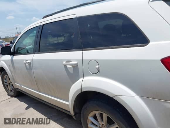 2017 Dodge Journey SXT with VIN 3C4PDCBG4HT590992, listed as a IAAI auction lot 42378549 with 275,884 mi miles and . Bid and sale history available at DreamBid. Image 14.