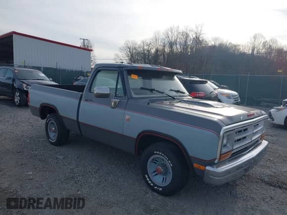 1988 Dodge D/W 100 with VIN 1B7FD04X9JS676023, listed as a IAAI auction lot 40746708 with 98,215 mi miles and . Bid and sale history available at DreamBid. Image 1.