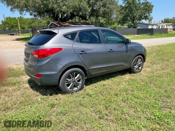 2014 Hyundai Tucson GLS with VIN KM8JT3AF3EU850880, listed as a Copart auction lot 80143135 with 124,054 mi miles and Clean title. Bid and sale history available at DreamBid. Image 4.