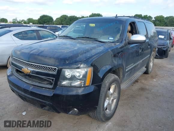 2014 Chevrolet Suburban LTZ with VIN 1GNSCKE08ER220808, listed as a IAAI auction lot 42022477 with 192,488 mi miles and . Bid and sale history available at DreamBid. Image 2.
