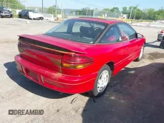 1996 Saturn 2dr Coupe с VIN 1G8ZH1275TZ263109, выставлен на аукционе IAAI как лот 42084877 с пробегом 131 134 миль миль и . История ставок и продаж доступна на DreamBid. Изображение 4.